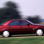 Front view of a silver 1998 Mercedes-Benz C280 sedan, showcasing its classic design and German engineering.