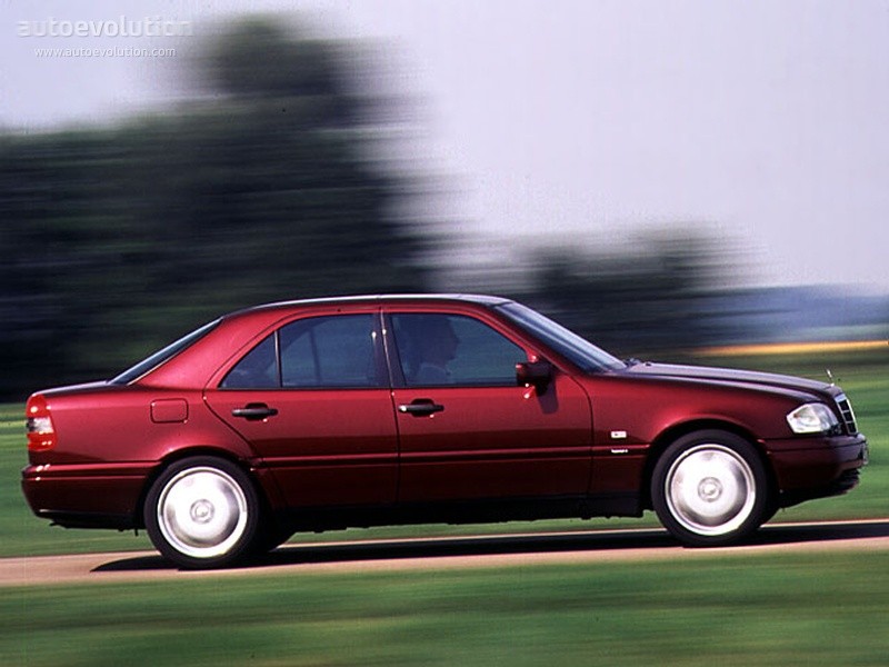 Front view of a silver 1998 Mercedes-Benz C280 sedan, showcasing its classic design and German engineering.