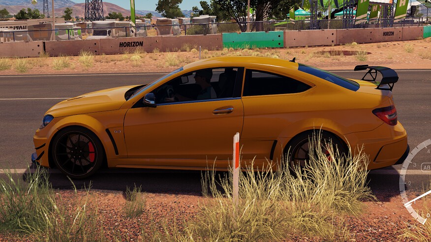 Mercedes Benz C63 AMG Black Series in Forza game showing missing chrome window trim, a visual defect in the low-quality model