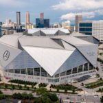 Mercedes-Benz Stadium interior showcasing seating and the halo video board