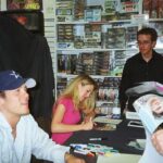 Mercedes McNab at an autograph session, showcasing her friendly demeanor and connection with fans, highlighting her role in popular tv shows.