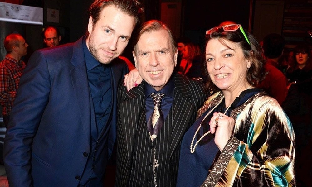 Mercedes Spall attending a movie premiere with her family, including her father Timothy Spall, a celebrated British actor.