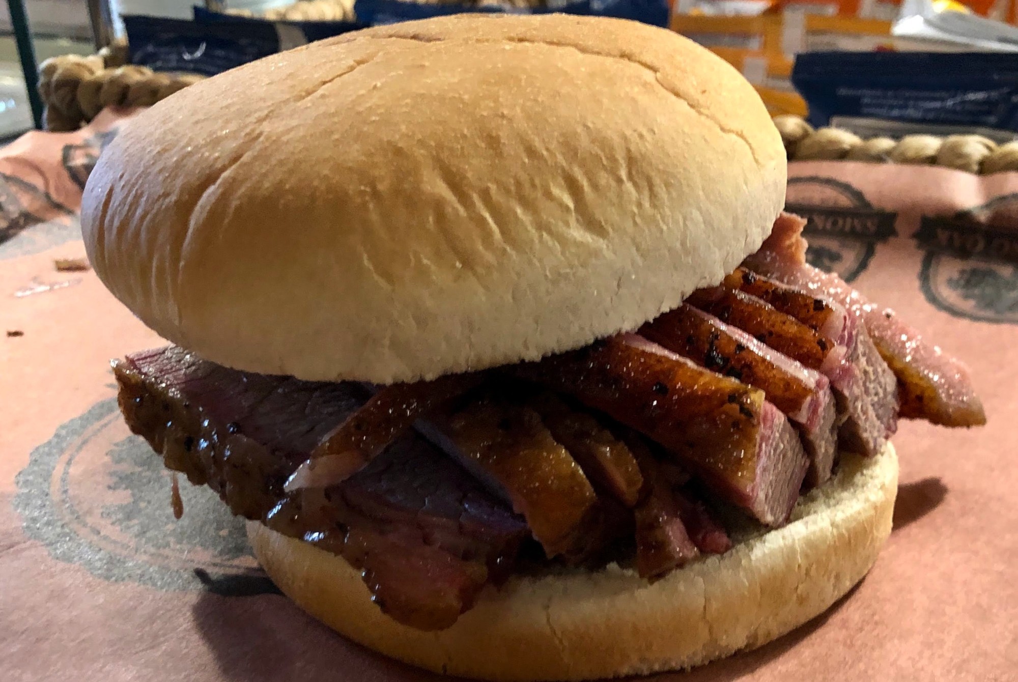 Mouthwatering brisket sandwich at Smokin Oak Mercedes TX, a Central Texas style barbecue restaurant.