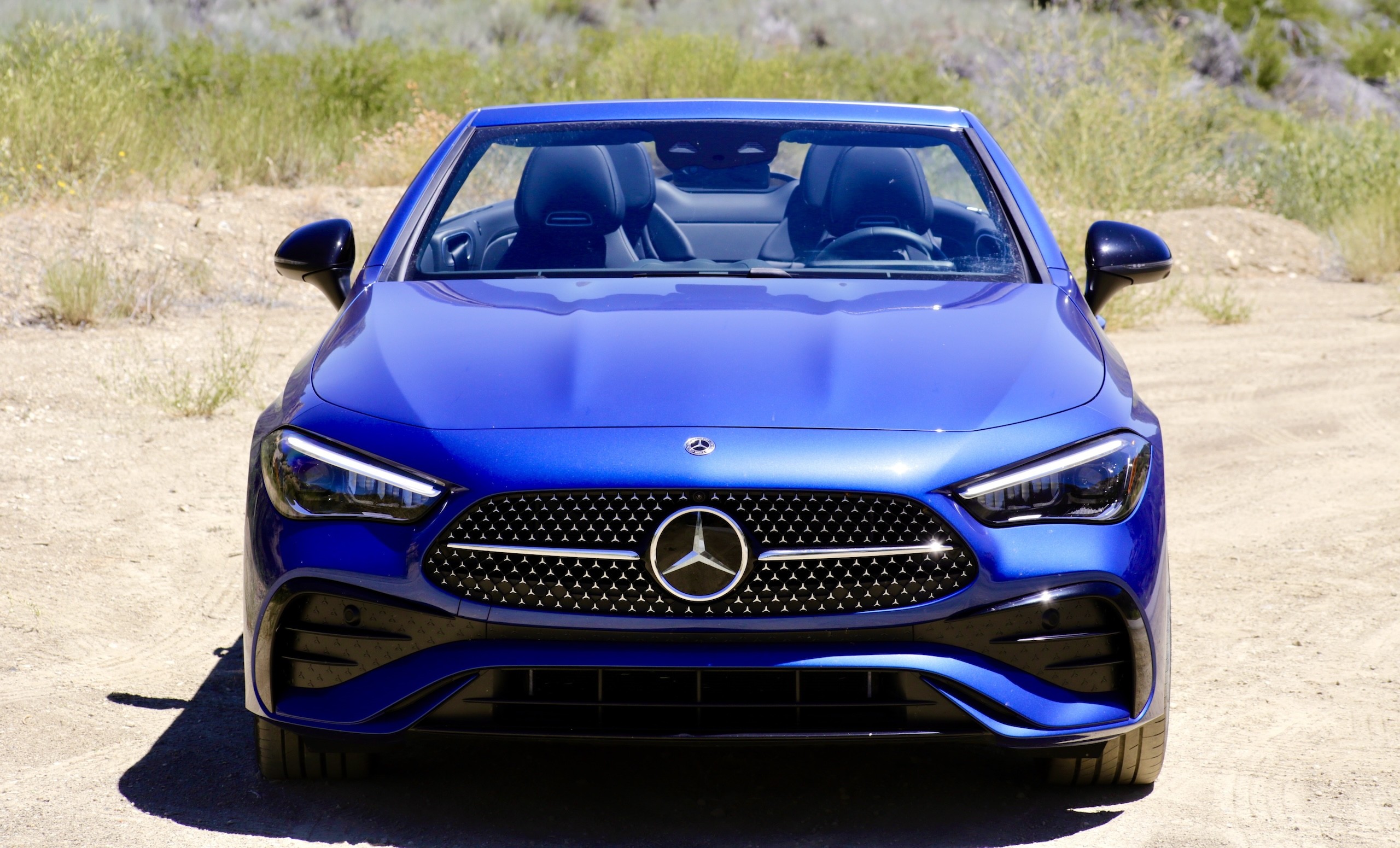 Side profile of the 2024 Mercedes-Benz CLE300 Cabriolet highlighting its balanced proportions and elegant silhouette.